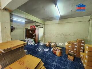 Interior space of a property with boxes and packing items