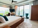 Spacious bedroom with modern furniture and direct pool access