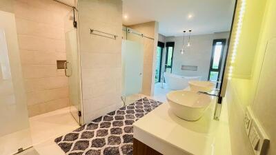 Modern bathroom with walk-in shower and bathtub