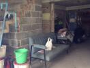 Unfinished basement with storage and seating area