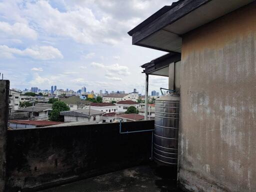 View from rooftop showing urban landscape