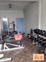 Home gym with exercise equipment and weights