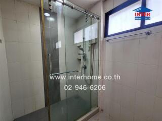 Bathroom with glass shower enclosure