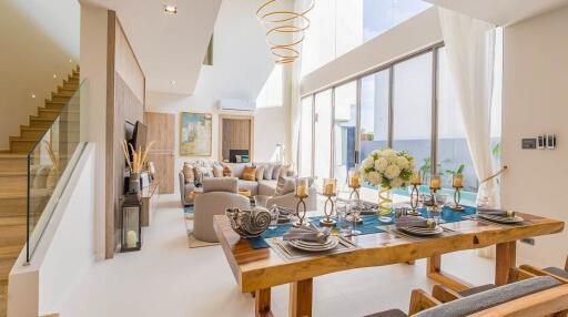 Bright and modern open living space with dining area and comfortable seating