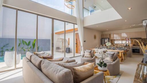 Spacious modern living room with large windows and stylish interior