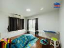 Bedroom with window, air conditioning, and children's play area