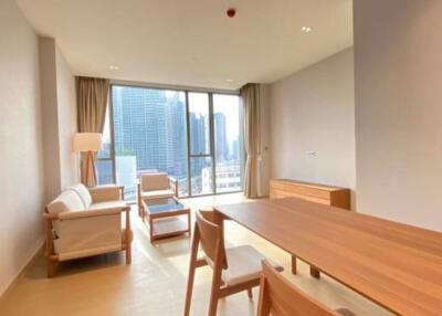 Spacious living room with a view of the city