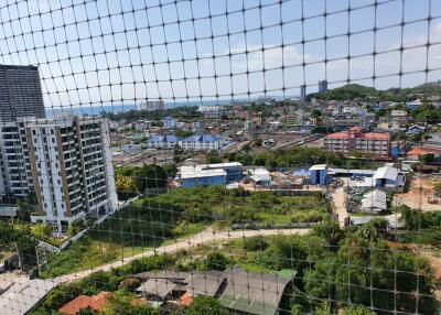 Panoramic city view from an upper floor