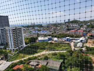 Panoramic city view from an upper floor