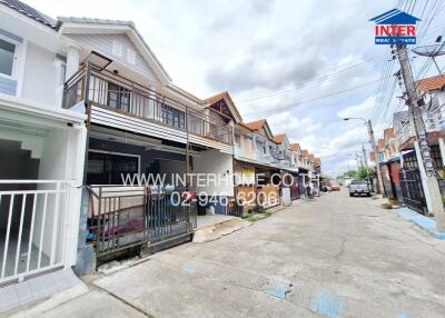 front view of residential buildings with street