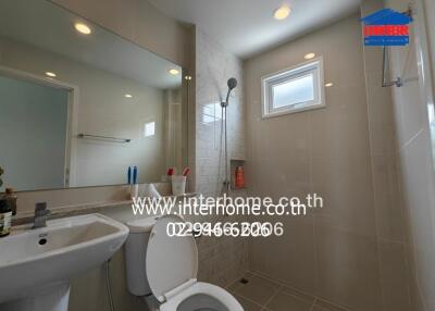 Modern bathroom with shower and toilet