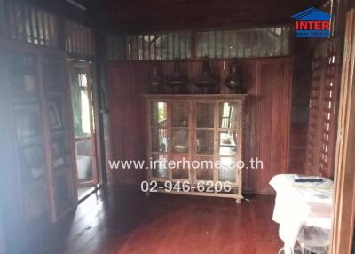 Traditional wooden living room with cabinet