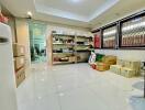 Spacious kitchen with storage shelves and ample lighting