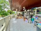 Outdoor storage area with shelves and boxes