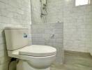 Modern bathroom with a tiled shower and toilet