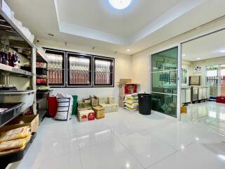 Storage area with shelves, boxes, and sliding glass door