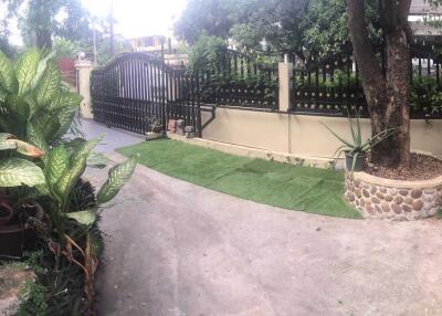 Front yard with a gated entrance