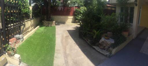 Outdoor area with garden and driveway