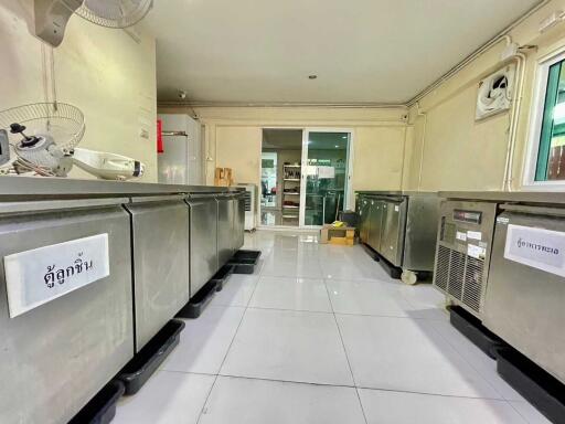 Commercial kitchen area with stainless steel appliances