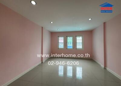 unfurnished room with pink walls and tile floor