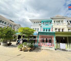 Colorful townhouses with greenery