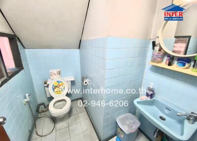 Small bathroom with blue tiles