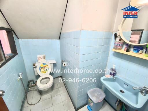 Small bathroom with blue tiles