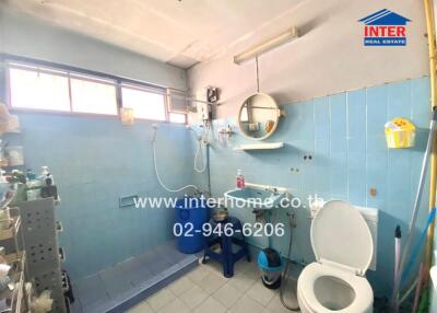 Bathroom with blue tiles