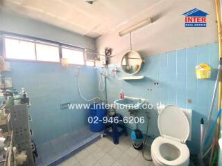 Bathroom with blue tiles