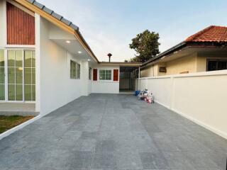 Exterior view of a residential property with driveway and attached garage