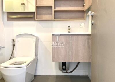 Modern bathroom interior with toilet and sink