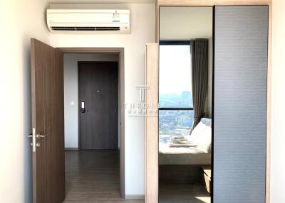 Bright bedroom with air conditioning and a view