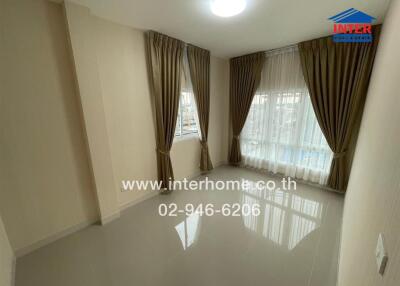 Empty bedroom with smooth floor and curtains