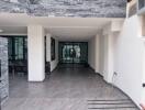 Main entrance of a property with stone walls and large glass doors