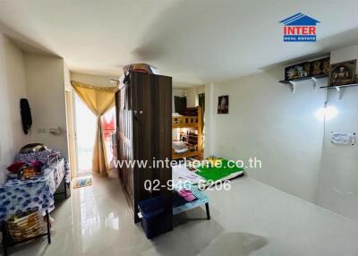 Bedroom with bunk bed and storage cabinets