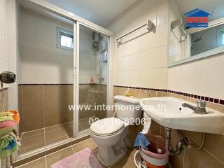 Modern bathroom with shower and vanity