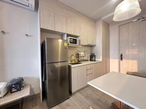 Modern kitchen with stainless steel appliances