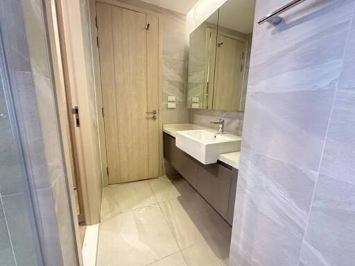 Modern bathroom with sink and large mirrors