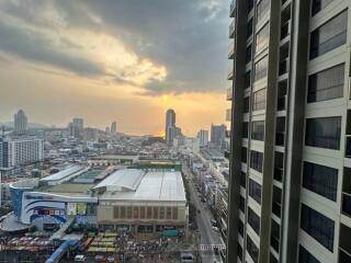 Cityscape view from a high-rise building during sunset