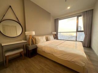 Modern bedroom with a large window view