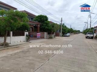 Street view of residential neighborhood with houses