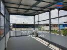 Spacious balcony with a roof and surrounding mesh