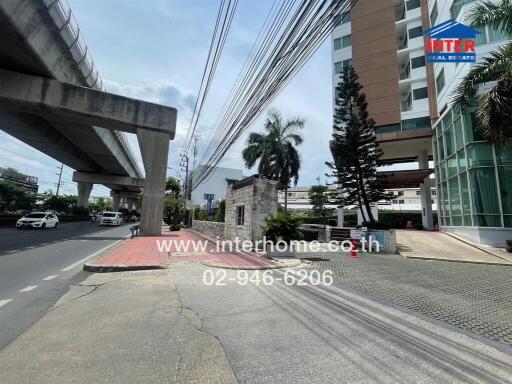 Modern building near an elevated transit way