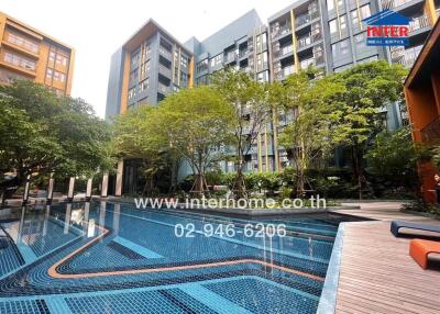 Outdoor view of building with swimming pool