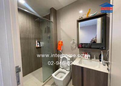 Modern bathroom with shower and vanity