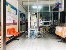 Building lobby or waiting area with chairs and notice boards