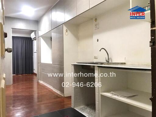 Functional kitchen with sink and storage in a modern apartment