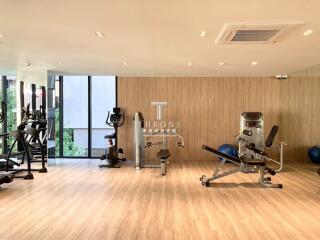 Modern fitness center with various exercise equipment