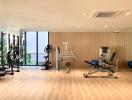 Modern fitness center with various exercise equipment