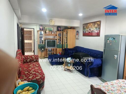 Living room with furniture and entertainment center